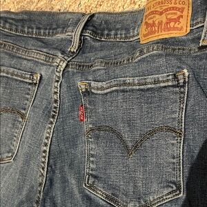 Levi's Blue Denim Jeans with Red Tab and Tan Leather Patch